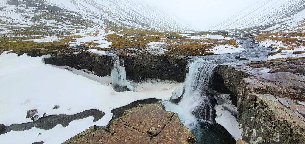 skutafoss waterfall winter iceland